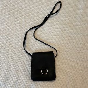 Black leather crossbody. Never been born